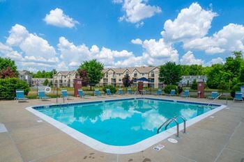 Poolside lounge chairs and tables