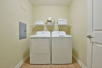 In-unit full size washer and dryer