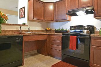 Well equipped kitchens with black ge appliances