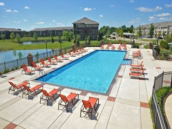 Outdoor swimming pool with large sundeck