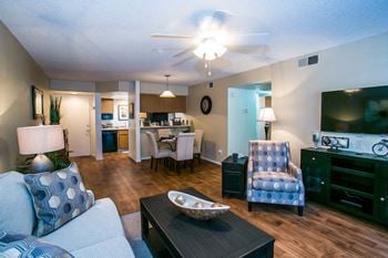 Towne square apartments spacious living room with ceiling fan
