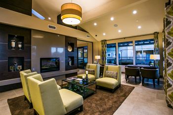 Towne square apartments resident clubhouse with hdtv, and a fireplace