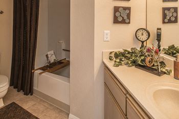 San tropez apartments bathroom with roman soaking tubs