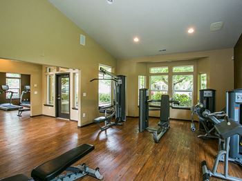 The park apartments fitness center with free weights