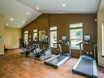 The park apartments fitness center with free weights