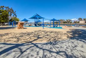 Long Beach apartment for rent - a playground at a park with shade structures