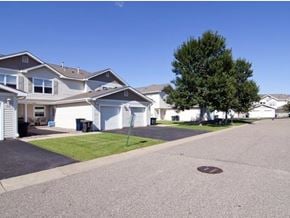 Farmington townhouse for rent - a row of houses on the side of a street