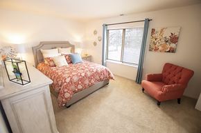 Glen Burnie apartment for rent - Bedroom with couch and bed at Hidden Woods Apartments, Glen Burnie 21061