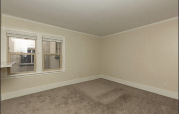 Seattle apartment for rent - the living room of a new home with carpet and a window