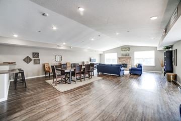 Butler apartment for rent - a living room and dining room with a table and chairs
