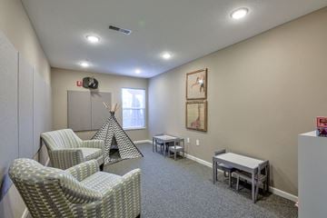 Willowick apartment for rent - a living room with couches and chairs and a fireplace