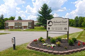 Harrodsburg apartment for rent - the sign in front of the schuman court apartments building