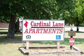 Aberdeen apartment for rent - a white sign in the middle of a park