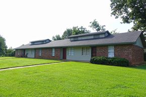 New Albany apartment for rent - a house with a green lawn in front of it