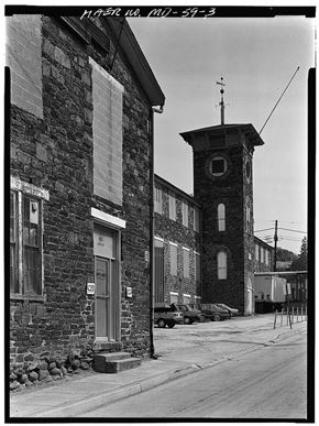 Baltimore apartment for rent - A black and white photo of a building with a clock tower.