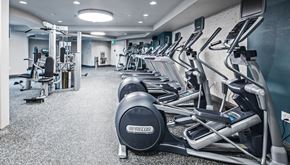 Bellevue apartment for rent - a row of exercise bikes in a gym