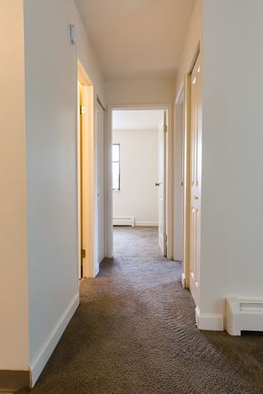 Wyoming apartment for rent - a living room with white walls and a carpeted floor