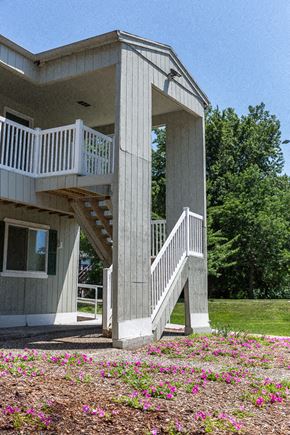 Wyoming apartment for rent - a house with a porch and stairs on it