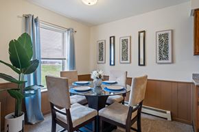 Grand Rapids apartment for rent - A dining room with a table set for four.