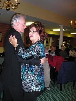 Pineville apartment for rent - An older couple dancing together in a room.