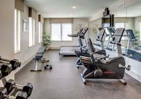 Bloomfield apartment for rent - a gym with treadmills and other exercise equipment on the floor