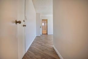 Los Angeles apartment for rent - a hallway with a door open to a bedroom and a bathroom