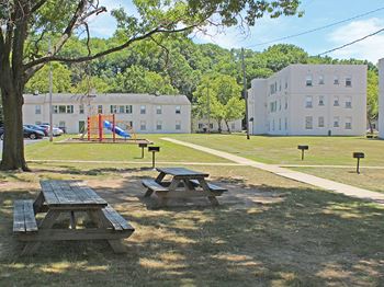 Picnic area with tables and charcoal grills