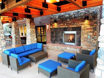 Ironhorse apartments outdoor lounge and fireplace