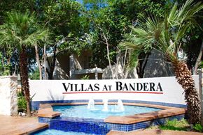 San Antonio apartment for rent - a sign for villas at bandera in front of a swimming pool