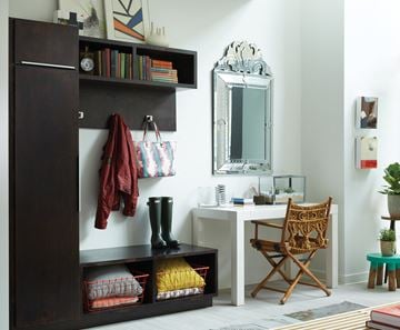 Grand Rapids apartment for rent - a living room with a cabinet with shelves and a desk with a chair and a