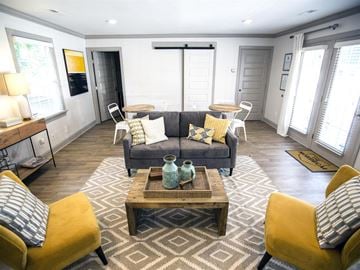 Raleigh apartment for rent - a living room with a couch and a coffee table