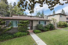 Sunnyvale apartment for rent - a house with a lawn and a sidewalk in front of it