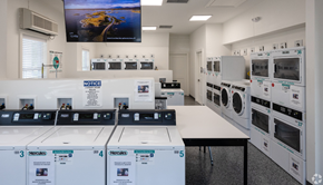 East Windsor apartment for rent - a laundry room with a bunch of washing machines