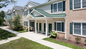 East Windsor apartment for rent - the front of a brick house with a walkway and sidewalk