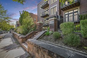 Denver apartment for rent - a view of a building with stairs and a sidewalk