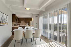 Denver apartment for rent - A dining room with a table set for four.