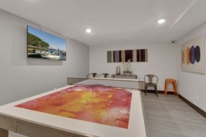 Denver apartment for rent - a room with a pool table and a painting
