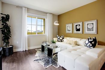 Hardwood-style flooring throughout kitchen, living and dining areas