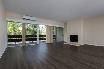 Wood floor living room and a fireplace