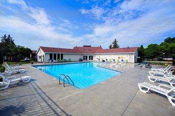 Private resident-only swimming pool with sundeck