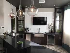 Gladstone townhouse for rent - a kitchen with a sink and a tv in it