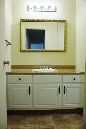Liberty apartment for rent - a bathroom with a sink and a mirror