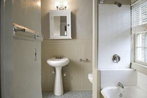 Birmingham apartment for rent - A white sink and toilet in a bathroom.