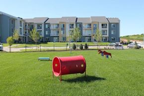 Verona apartment for rent - a red mailbox in the grass in front of an apartment building