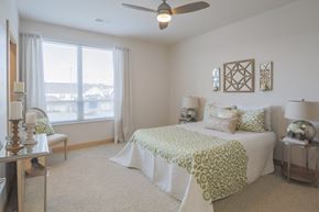 Verona apartment for rent - a bedroom with a bed and a ceiling fan