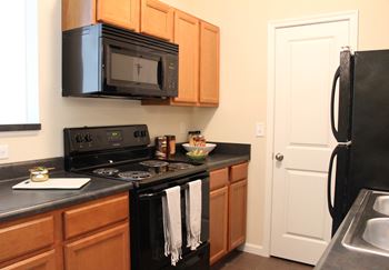 Kitchen with black appliances