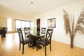 Ottawa apartment for rent - a dining room with a table and chairs