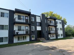 Columbia apartment for rent - Apartment buildings with balconies and doors are shown in the image.