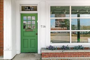 Highland Park apartment for rent - a green door on the side of a building