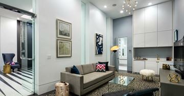 New Orleans apartment for rent - a living room with a couch and a glass door